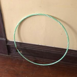 Its a normal hoola hoop that had a gold mark candycane pattern and it shakes.
